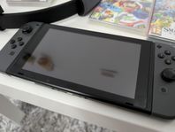 Nintendo switch med spel och tillbehör