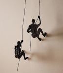 Väggdekoration "Human climbers".