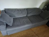 Grå bäddsoffa gratis!