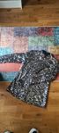 Glittrig blus
