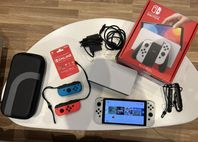 Nintendo Switch OLED (Vit) + Extra Joy-Cons + Fodral- som ny