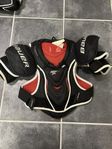 axelskydd ishockey