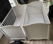 Tvillingar? två spjälsängar 