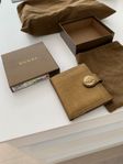 gold leather patent Gucci wallet
