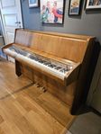 Nätt Schimmel -piano skänkes