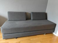 sofa bed and sport equipment 