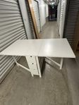 fällbord med förvaring lådor