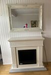 kamin . spegel