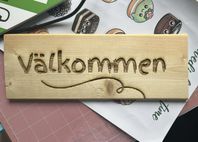 välkommen träskylt