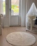 Beige rund matta