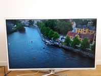 Samsung 40 tum tv med vägfäste 
