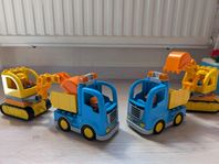 Dubbel uppsättning av duplo grävmaskin och dumper