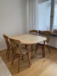 Matbord med iläggsskiva + 4 stolar