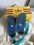 Gucci x adidas tofflor