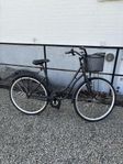 En svart damcykel 