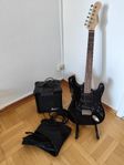 elgitarr med förstärkare o kablar