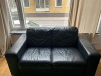 Good condition 2 seater black couch