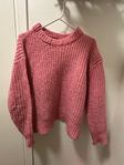 Pink knitted jumper