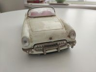 Gamla plåtleksaksbilar