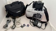 Canon kamerahus med inbyggd blixt med extra tillbehör