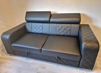 svart bäddsoffa