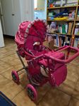 Rosa leksaksbarnvagn
