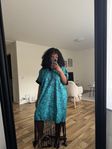 "Amaka" bubuklänning med fransar