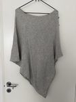 Stickad poncho