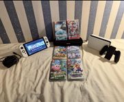 Nintendo Switch OLED + 8spel+ väska- Fint skick