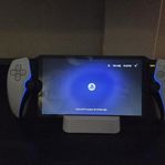 Playstation Portal med låda och tillbehör