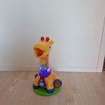 Bright Starts Spin & Giggle Giraff–Light-Up Musical Ball