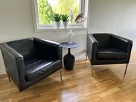 Två skinnfåtöljer IKEA Klappsta