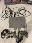 Playstation 1 med 13 spel och 2 handkontroller. 