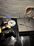 PS4 med spel och kontroller