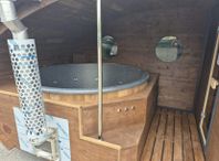 Bastu med badtunna vedeldad