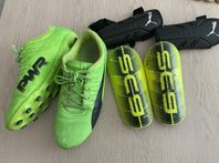 Puma Fotbollsskor stl 38,5 - inkl två par benskydd