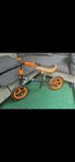 Springcykel / Balanscykel för barn – svart/orange