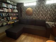 Mörkgrå bäddsoffa