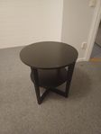 svart runt bord