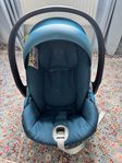 Cybex bilbarnstol barnskydd + adapter till barnvagn