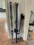 Selling two pairs of skis 
