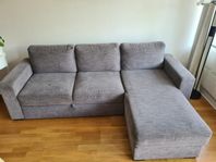 Grå bäddsoffa med förvaring