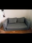grå bäddsoffa 