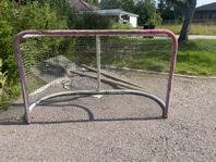 hockey mål med en skott platta 