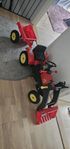 traktor med släpp och gräv gaffel