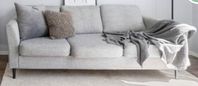 Free sofa with cushions and blanket