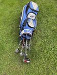 Golfbag med diverse klubbor