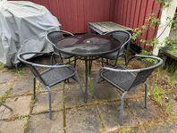 Trädgårdgrupp 4 stolar och glasbord