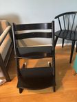 Svart Stokke Trip Trap med fallstöd