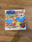 Kattens pyjamas spel 3-8 år 